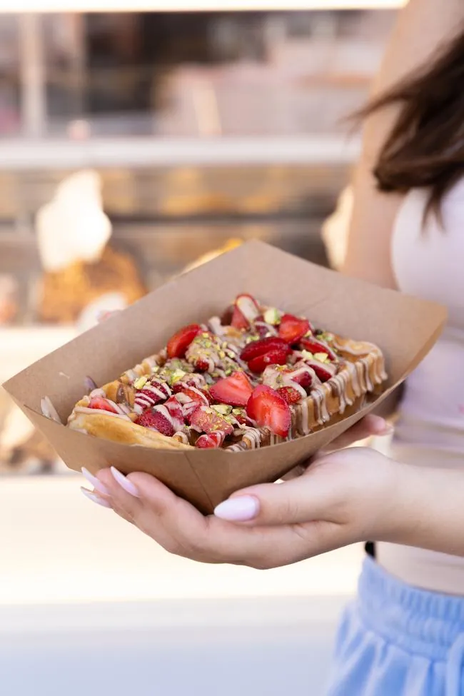 Guest holding a Chanté waffle